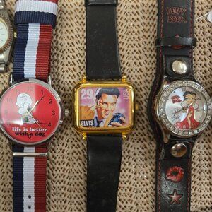 PICK A WATCH .. ELVIS PEANUTS BETTY BOOP